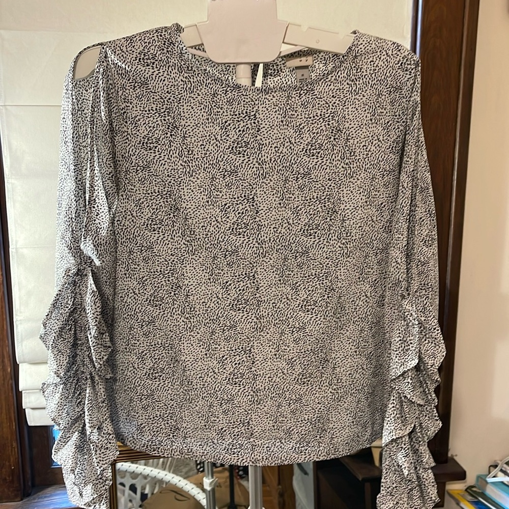 A New Day ruffled long sleeve blouse with cut outs from shoulder down.